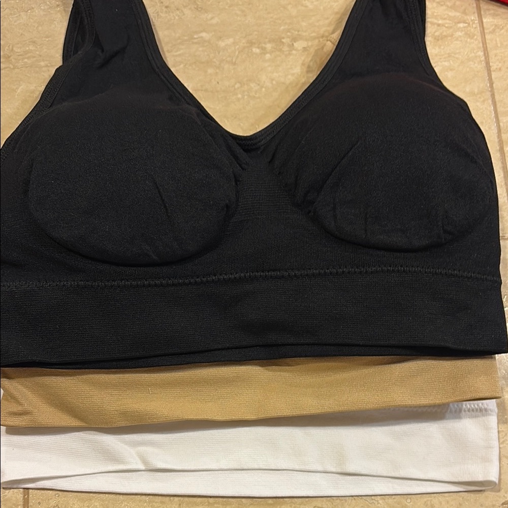 Women's Black, Tan, and White Sports Bras